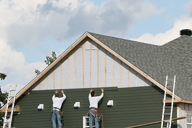 Professional Emergency Siding Repair technician working in Erie, IL